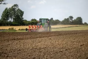 view of a plough equiped with a built-in roller helping saving time for seedbed preparation